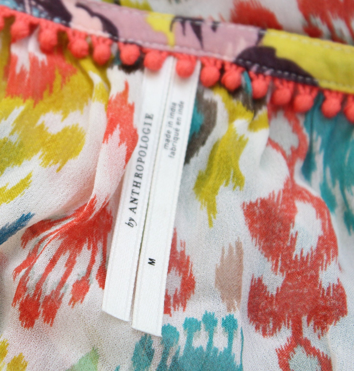 by Anthropologie Maureen Babydoll Tiered Tunic Top Blouse M Geometric Colorful Long Sleeve