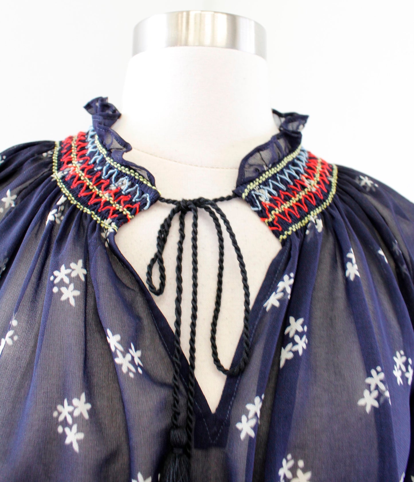 CAbi Enjoy Top Navy Blue Sheer Floral Embroidered Smocked Tie Neck Top Size XS
