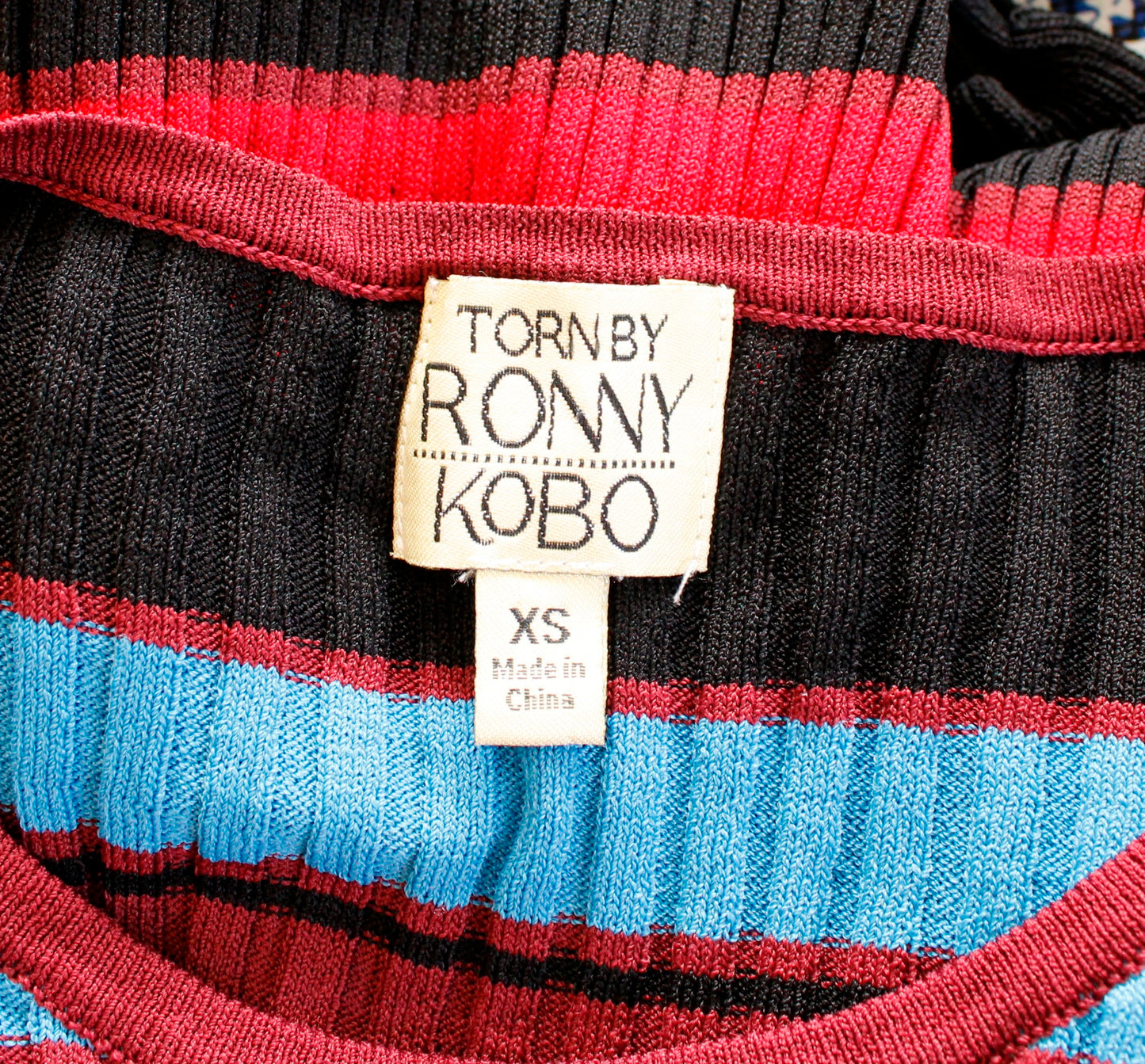 Torn Ronny Kobo Black Blue Red Striped Ribbed Knit Peplum Top Size XS Blouse